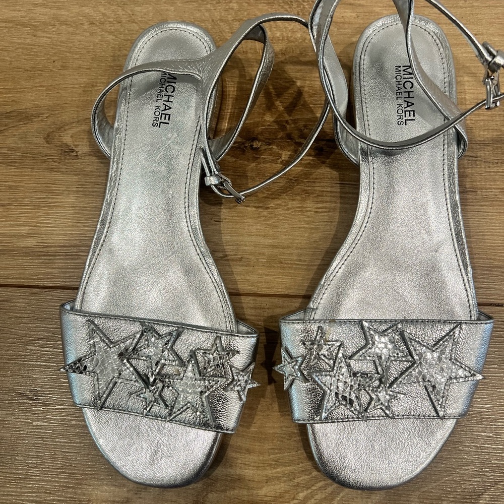 Michael Kors silver metallic leather sandals with stars.  Mirrored heel